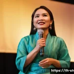 스토리텔러 실기 시험의 주요 평가 요소와 전략 분석과 연구 - **A Captivating Storyteller Engaging an Audience:** A vibrant, medium shot of a female storyteller i...